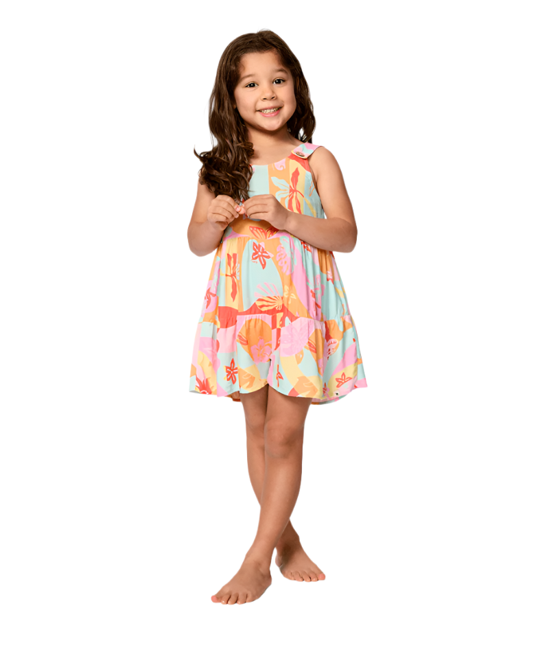 Young girl wearing a colorful dress on a white background